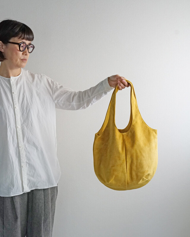▲ドロップトートバッグは、80gとりんご約1個分ほどの重さです。